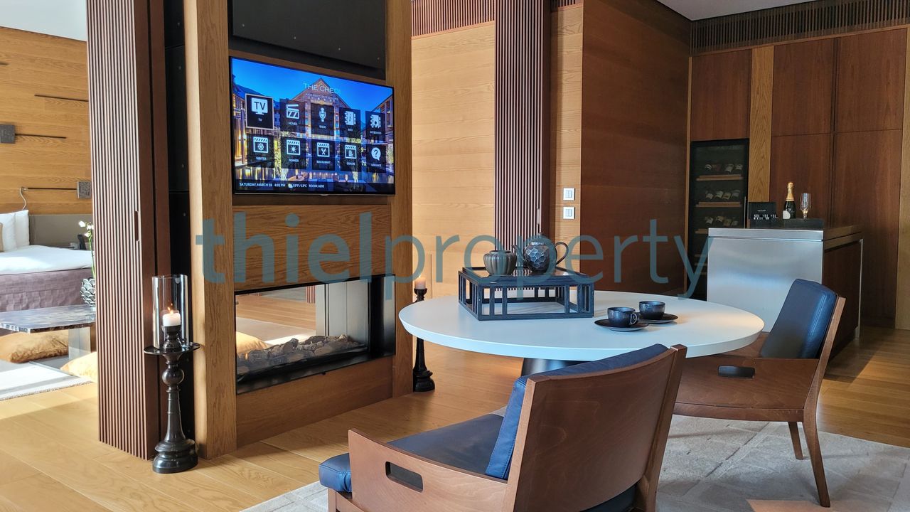 living room with dining table and kitchenette, fireplace